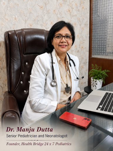 Dr. Manju Dutta, Paediatrician, at her desk